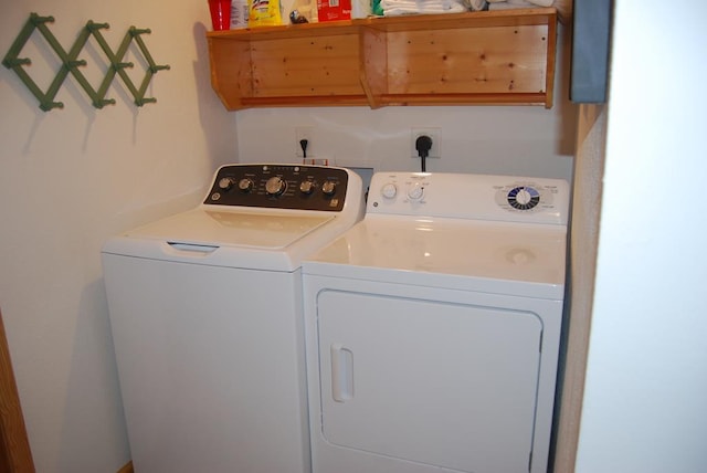 washroom with washer and dryer