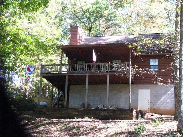 2520 Rd 4748, Hiawassee, GA 30546 - back of property with stairs, a wooden deck, and a chimney
