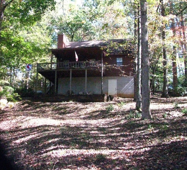 2520 Rd 4748, Hiawassee, GA 30546 - back of house with a wooden deck, a chimney, and stairs