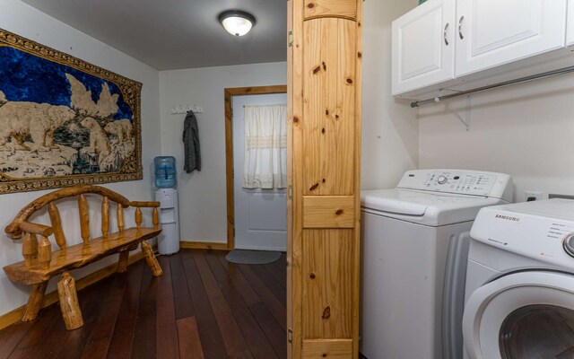 clothes washing area with washer and clothes dryer and wood-type flooring