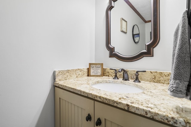 bathroom with vanity and a textured ceiling