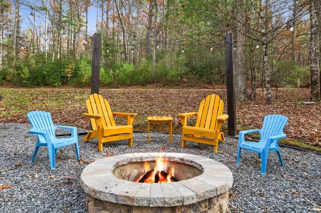 view of patio with a fire pit