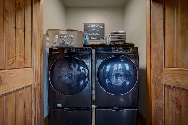 clothes washing area featuring laundry area and independent washer and dryer