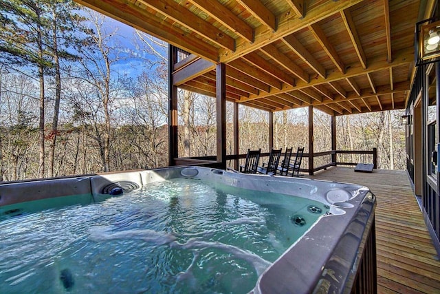 deck with a hot tub