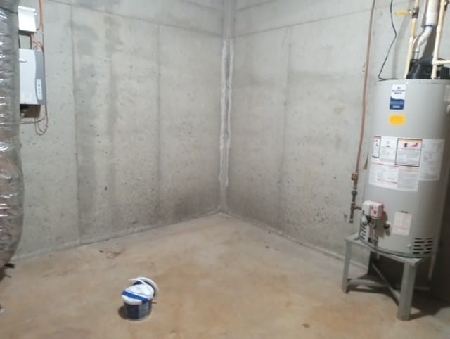 basement featuring water heater