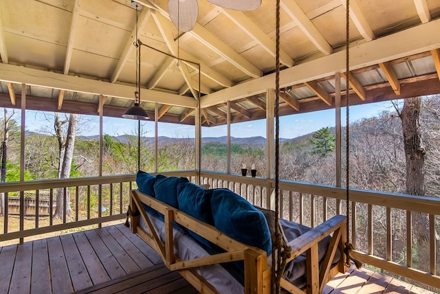 wooden deck featuring a mountain view
