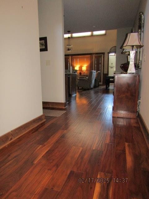 hallway featuring dark hardwood / wood-style floors