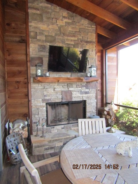 view of patio featuring an outdoor stone fireplace