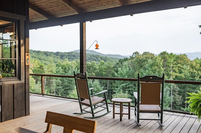 deck with a forest view