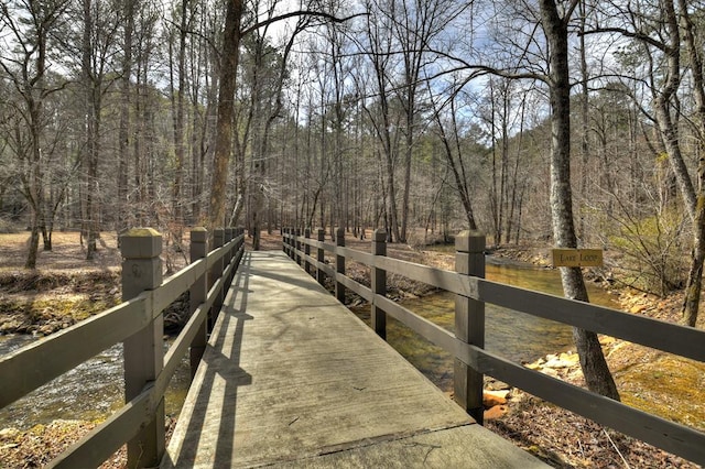 view of home's community with a forest view