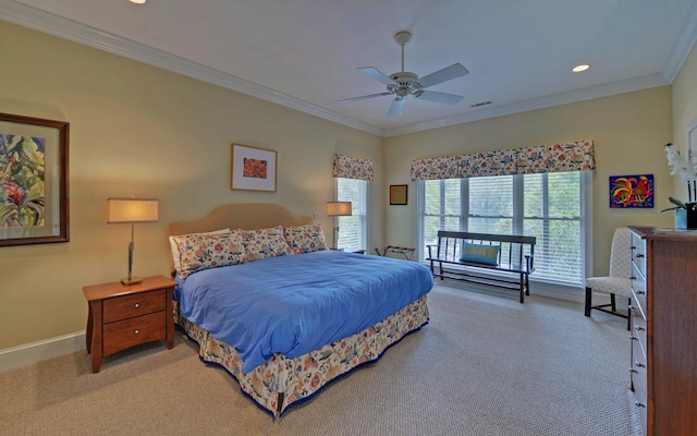 bedroom featuring crown molding, ceiling fan, and carpet flooring