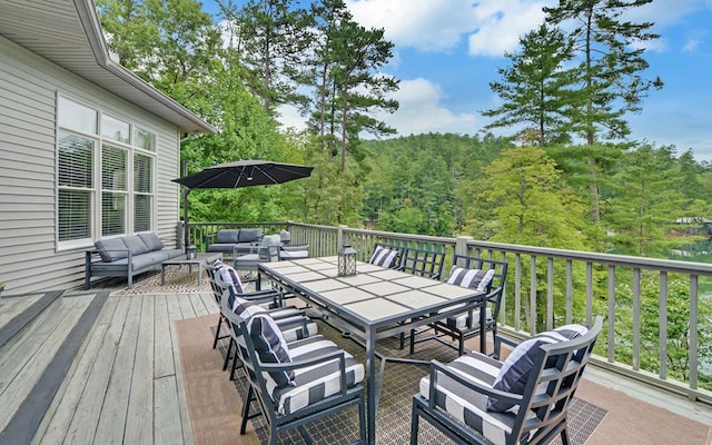 wooden terrace featuring an outdoor living space