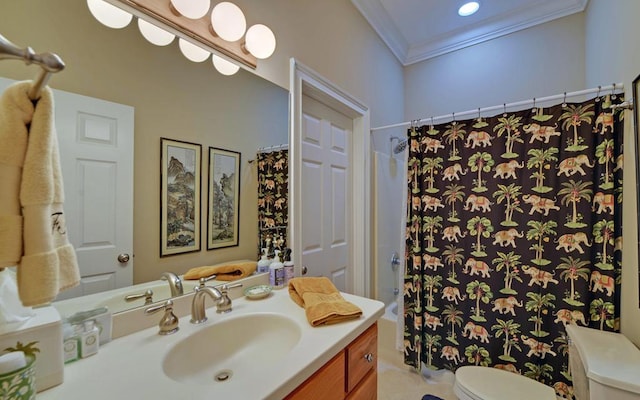 bathroom featuring a shower with curtain, ornamental molding, vanity, and toilet