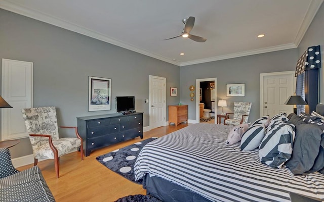 bedroom with crown molding, ceiling fan, and light hardwood / wood-style flooring