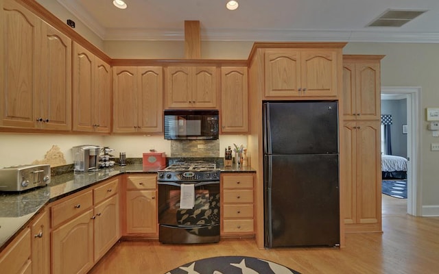 kitchen with ornamental molding, light hardwood / wood-style flooring, light brown cabinetry, and black appliances