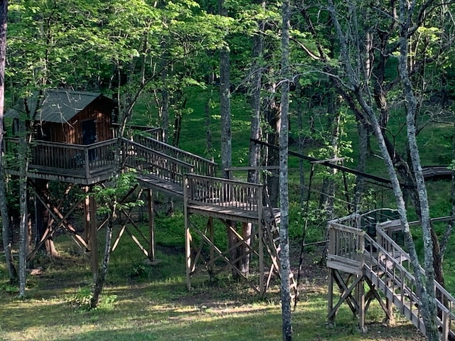 view of yard with a wooden deck