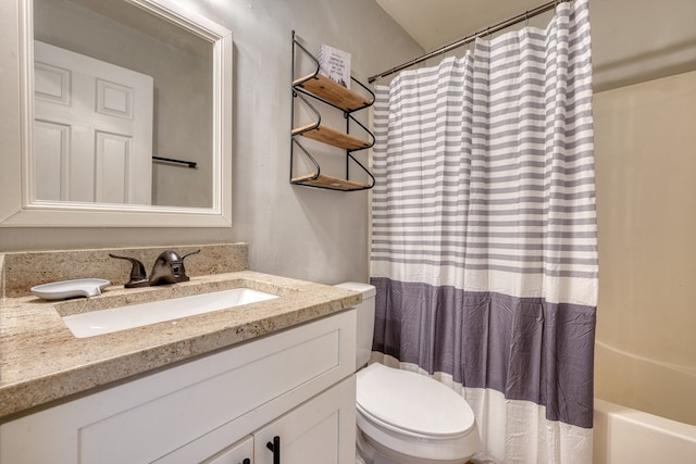 full bath featuring shower / bathtub combination with curtain, vanity, and toilet