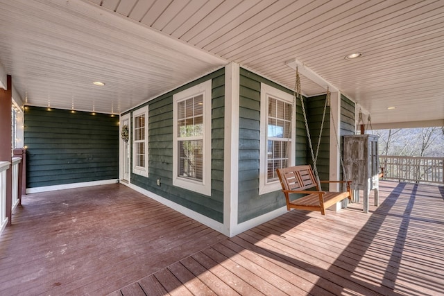 deck featuring covered porch