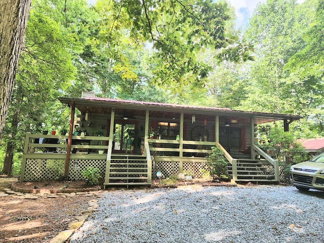 view of front of home with a sunroom