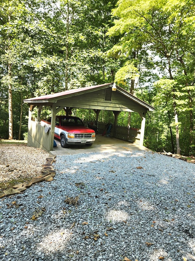 view of car parking with a carport