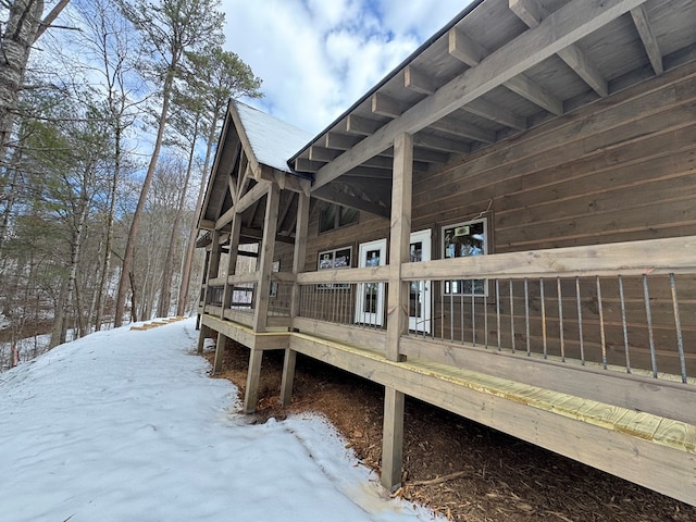 view of snow covered deck