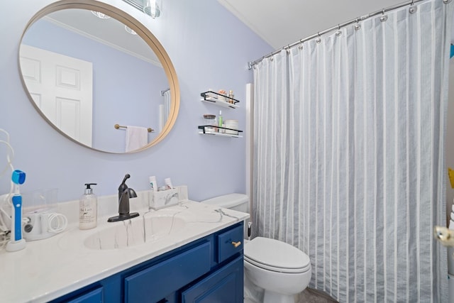 bathroom featuring toilet, a shower with curtain, and vanity