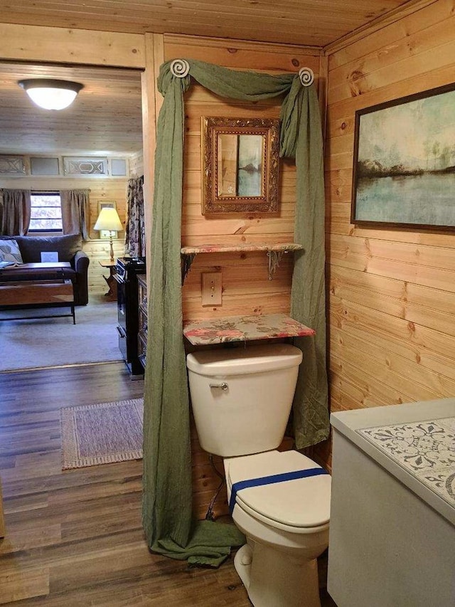 4334 River Bank Run, Hiawassee, GA 30546 - half bath featuring wooden walls, toilet, wood finished floors, vanity, and wooden ceiling