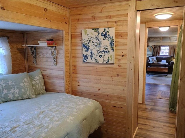 4334 River Bank Run, Hiawassee, GA 30546 - bedroom featuring wooden walls and wood finished floors