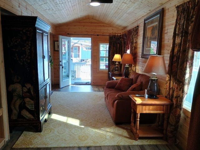 4334 River Bank Run, Hiawassee, GA 30546 - living area featuring wood walls, lofted ceiling, wood finished floors, ceiling fan, and wood ceiling