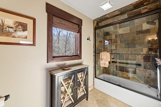 interior space with visible vents and combined bath / shower with glass door