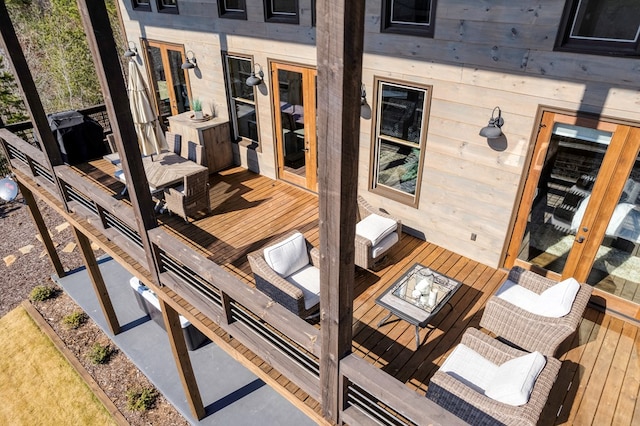 wooden terrace featuring french doors