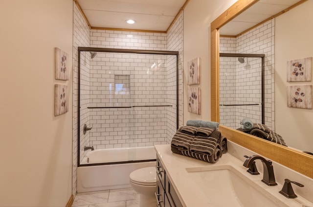 full bathroom featuring vanity, toilet, marble finish floor, enclosed tub / shower combo, and recessed lighting