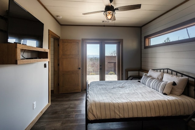 bedroom with ceiling fan, access to exterior, french doors, visible vents, and dark wood-style floors