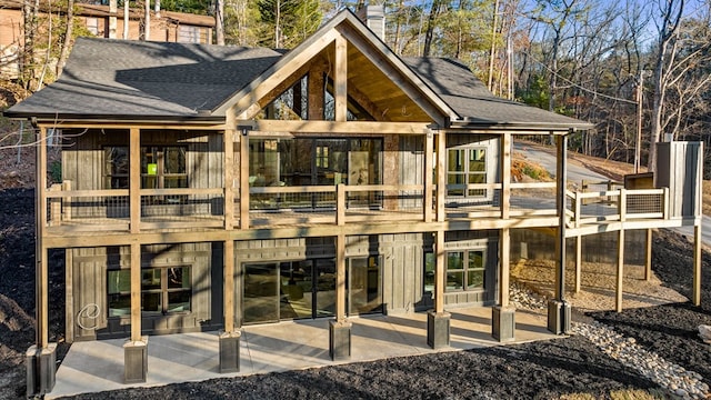 rear view of property featuring a patio