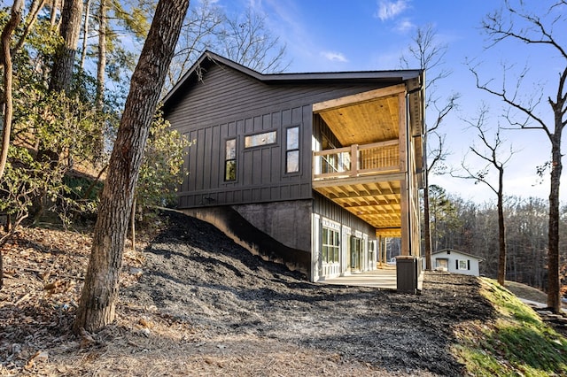 view of property exterior featuring a balcony