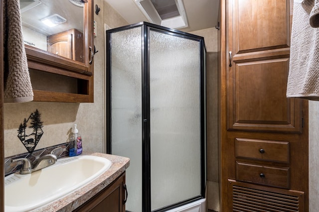 bathroom featuring vanity and walk in shower