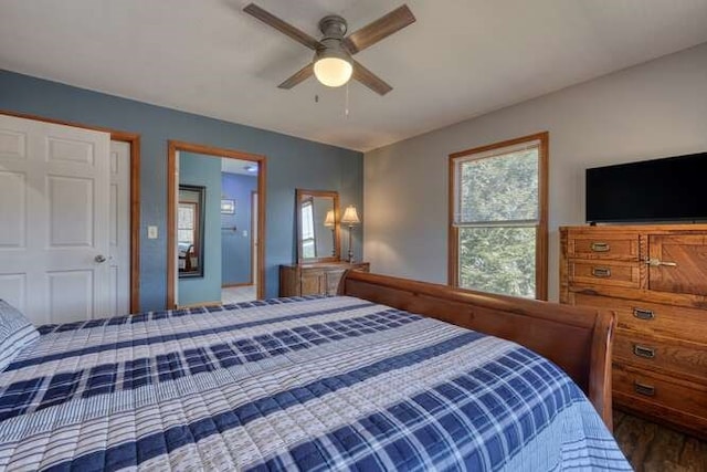 bedroom featuring ceiling fan and wood finished floors