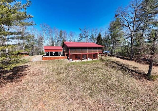 back of property with an outbuilding and exterior structure