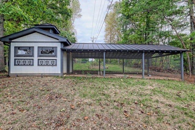 view of yard with a carport