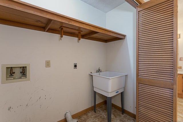 clothes washing area with hookup for a washing machine and electric dryer hookup