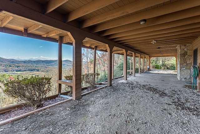 view of patio / terrace featuring a mountain view