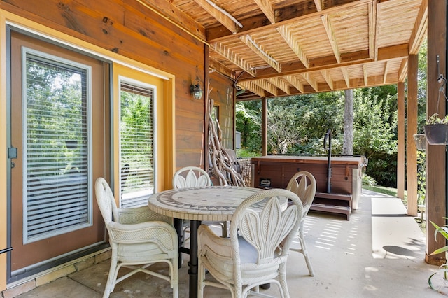 view of patio featuring a hot tub