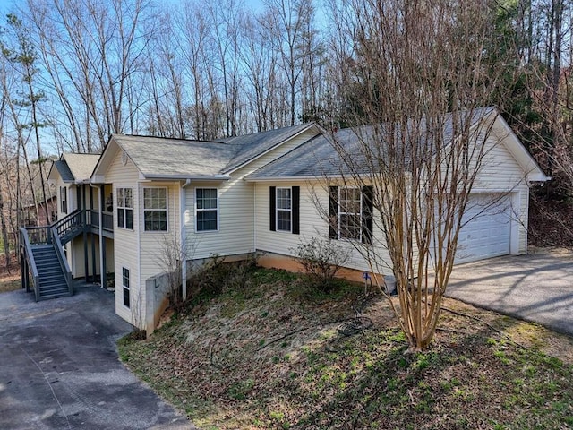 single story home with a garage