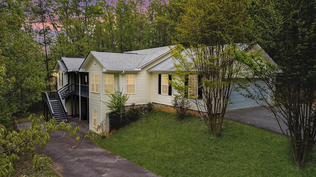 35 Deer Run Rd, Blairsville, GA 30512 - ranch-style home featuring driveway, stairs, a front lawn, a garage, and roof with shingles