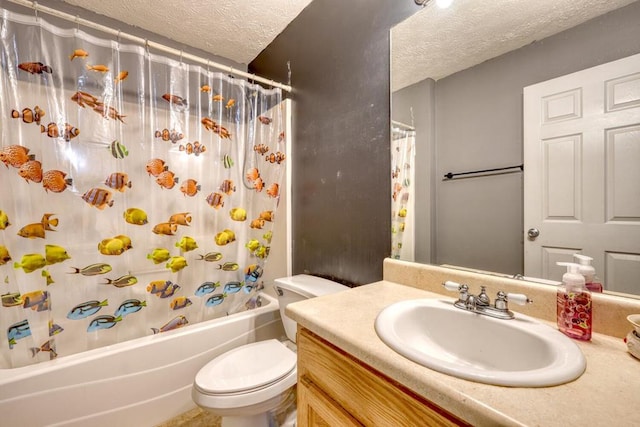 full bathroom featuring vanity, shower / bath combo, toilet, and a textured ceiling