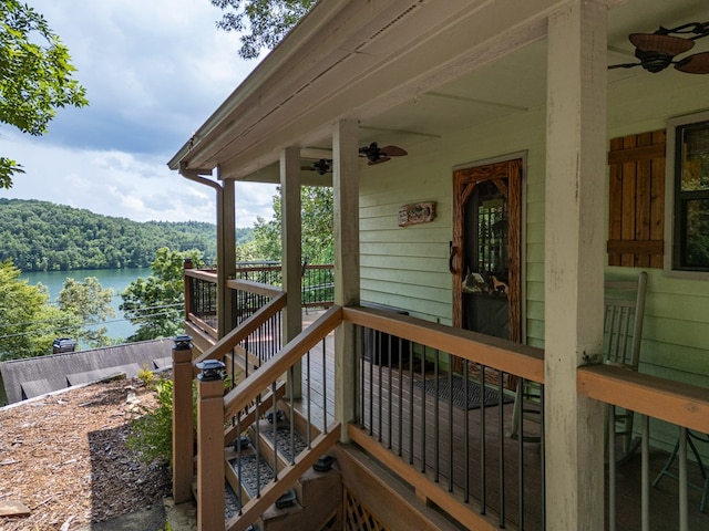 40 White Cloud Dr, Murphy, NC 28906 - wooden terrace with a ceiling fan, a water view, and a wooded view