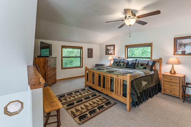 40 White Cloud Dr, Murphy, NC 28906 - bedroom featuring carpet floors, multiple windows, vaulted ceiling, and ceiling fan