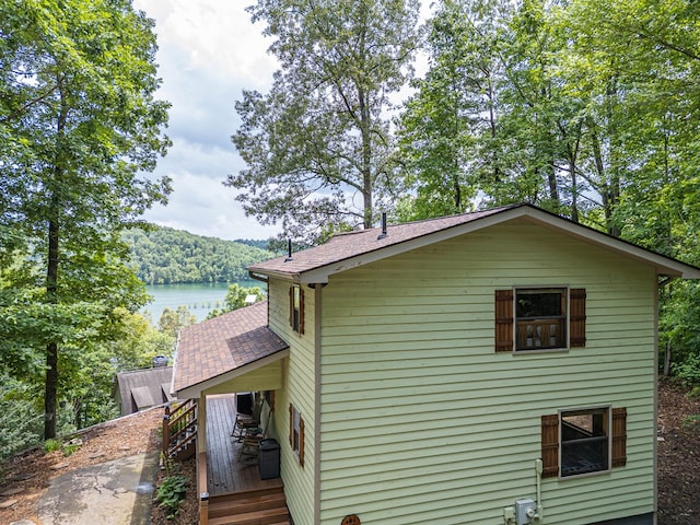 40 White Cloud Dr, Murphy, NC 28906 - view of side of home with a shingled roof and a deck with water view