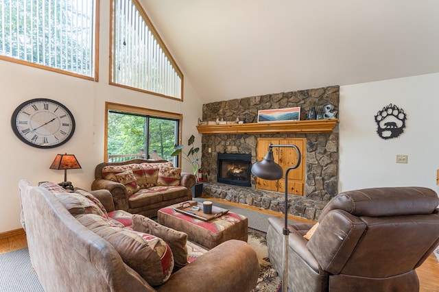40 White Cloud Dr, Murphy, NC 28906 - living area featuring a fireplace, wood finished floors, and high vaulted ceiling