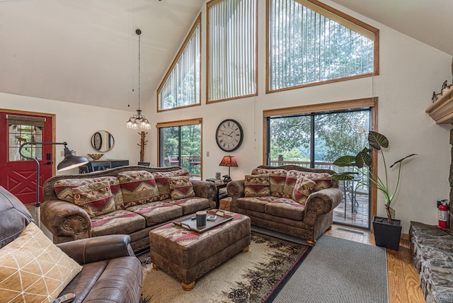 40 White Cloud Dr, Murphy, NC 28906 - living area with a high ceiling, wood finished floors, and a chandelier